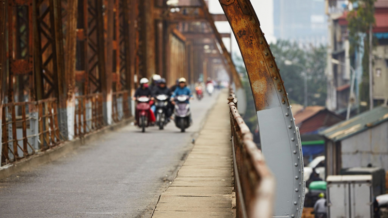 Cycling On The Century Old Long Bien Bridge
