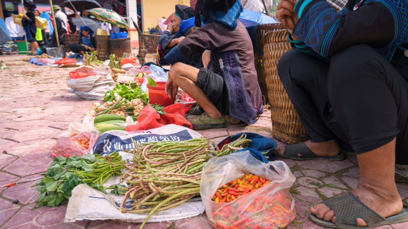 Enjoy The Lively Ambiance Where People Gather And Mingle At Cao Son Market