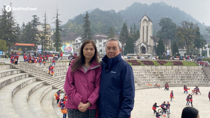 A Senior Couple Enjoy The Stunning View In Sapa