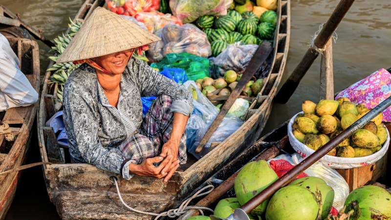 Observe The Busy Trading Of People At Thom Coconut Floating Market