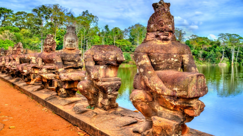 Amazed At Hundreds Of Stone Statues With Many Shapes At South Gate Of Angkor Thom
