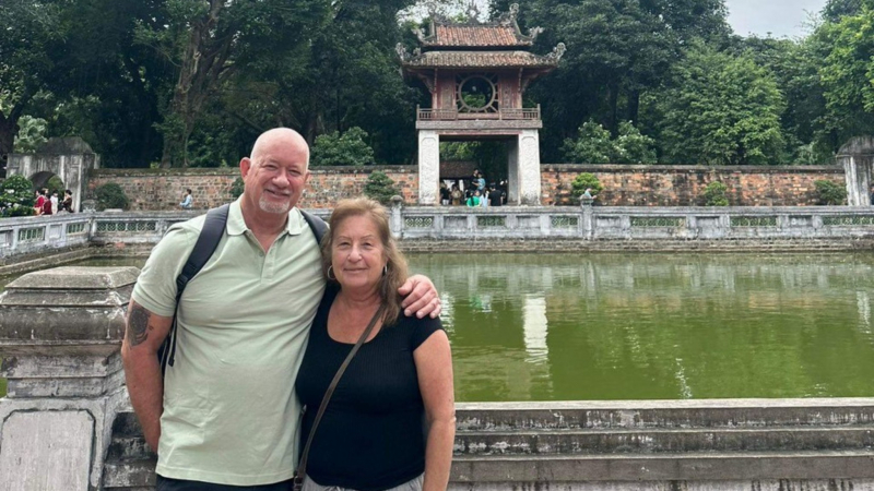 A Couple By The Small Pond Of The Temple Of Literature Complex