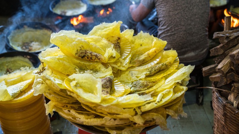 Day 1 Savor The Crispy Delight Of Banh Xeo Filled With Shrimp, Pork, And Fresh Herbs