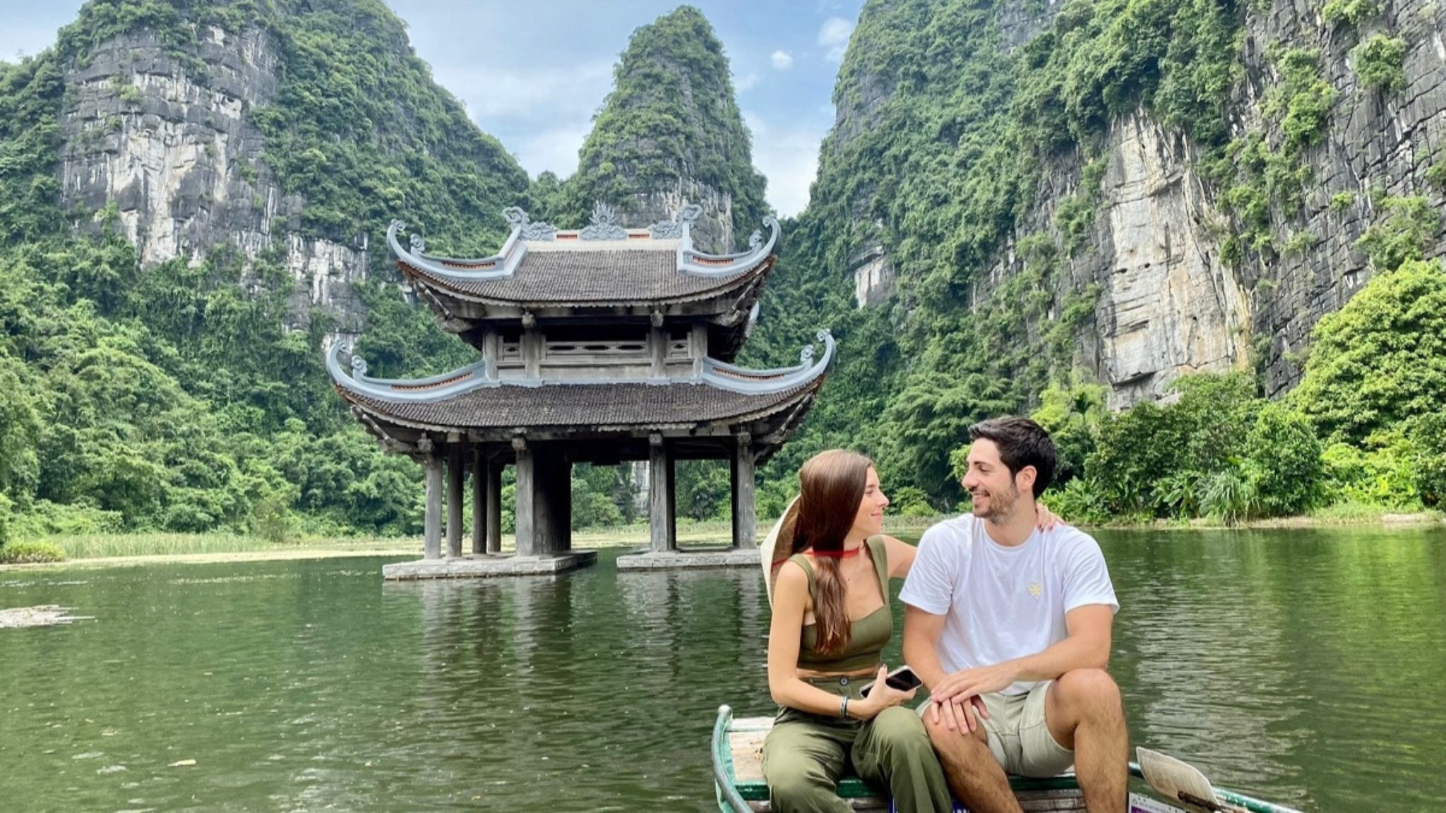 Tourists Enjoy The Beauty Of Tam Coc