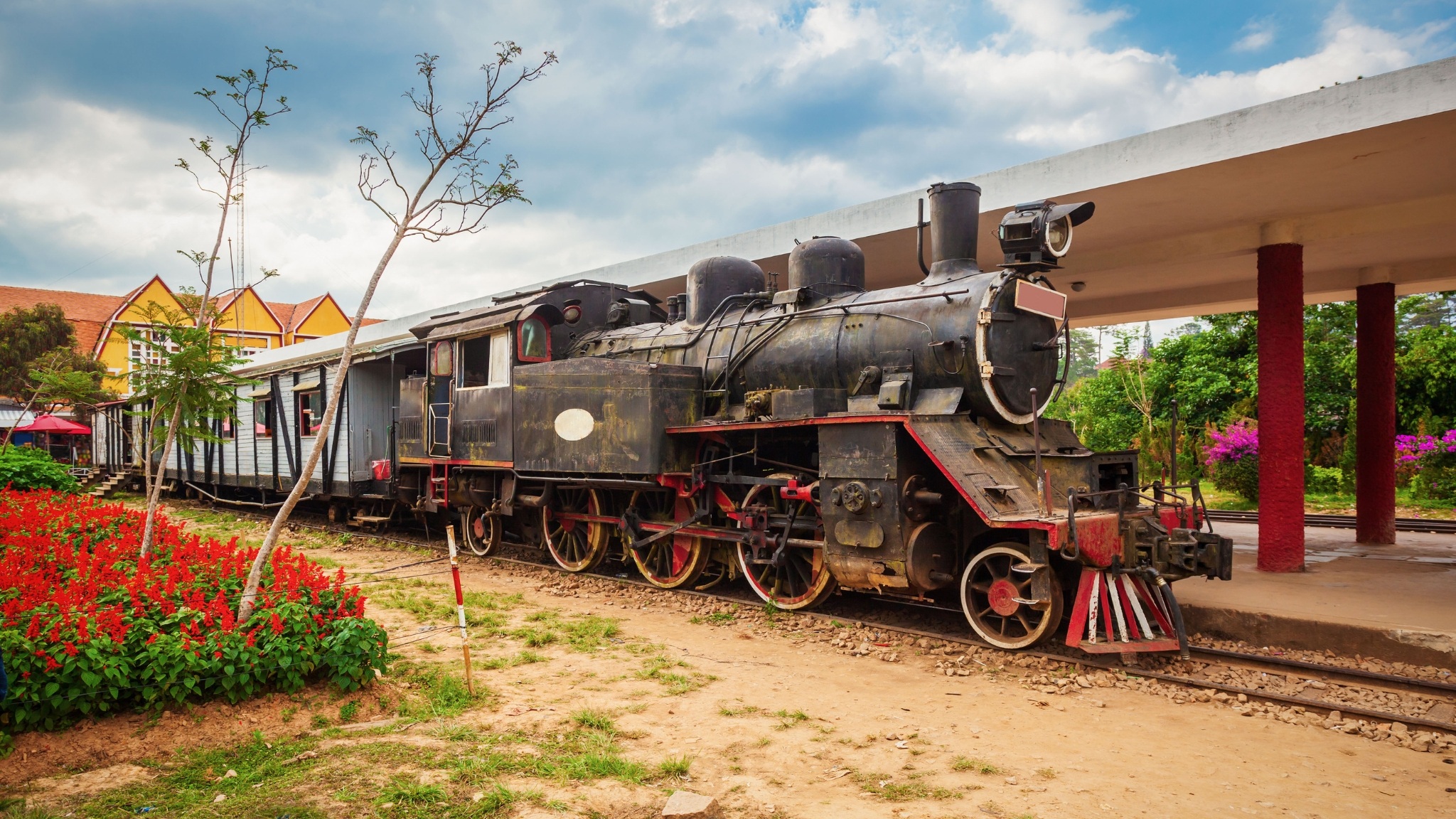 Day 4 Admire The Distinctive Architecture Of Da Lat Railway Station With Its Iconic Yellow Facade And Pointed Roofs