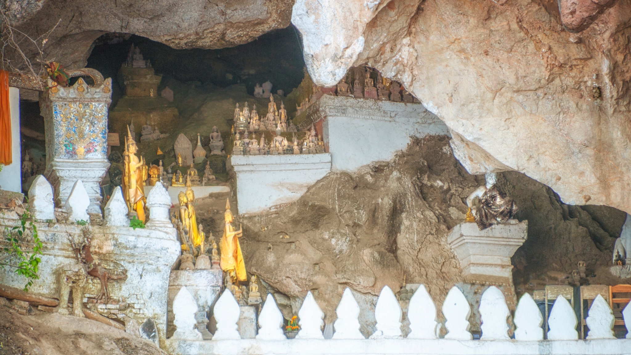 Day 8 Explore The Mysterious Pak Ou Caves Home To Thousands Of Ancient Buddha Statues