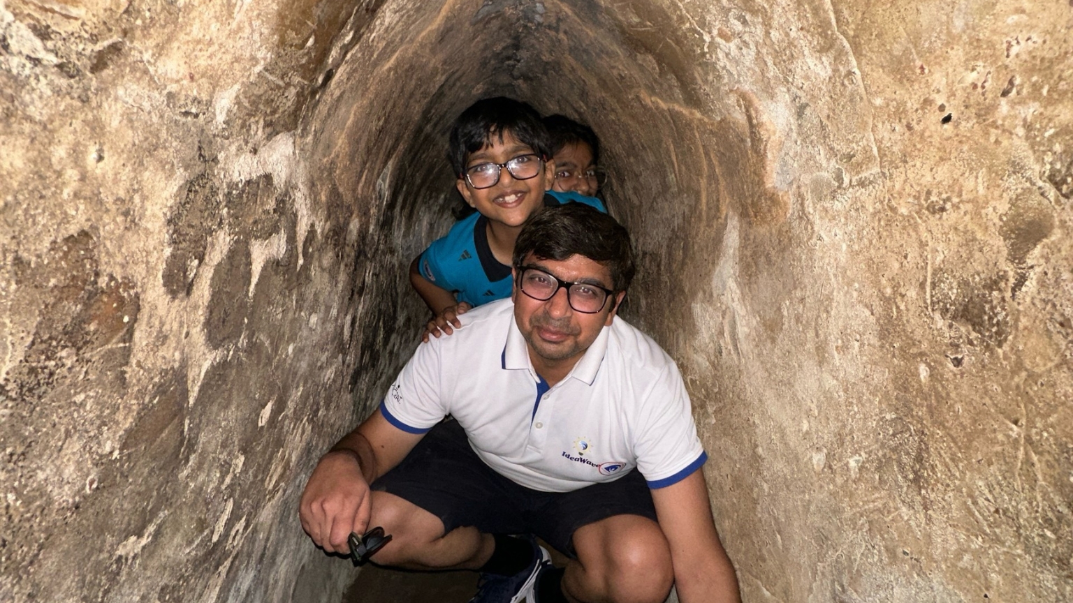 Kids exploring the Cu Chi Tunnels