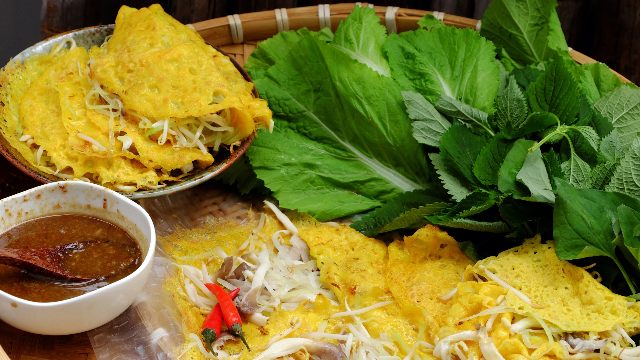 Day 1 Enjoy Banh Xeo (crispy Pancakes) Served With Dipped Sauce And Fresh Herbs